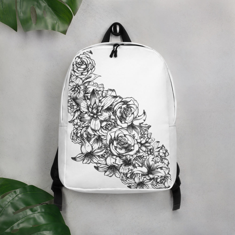 a mini backpack with flowers wight InkFinite Flower Power Backpack